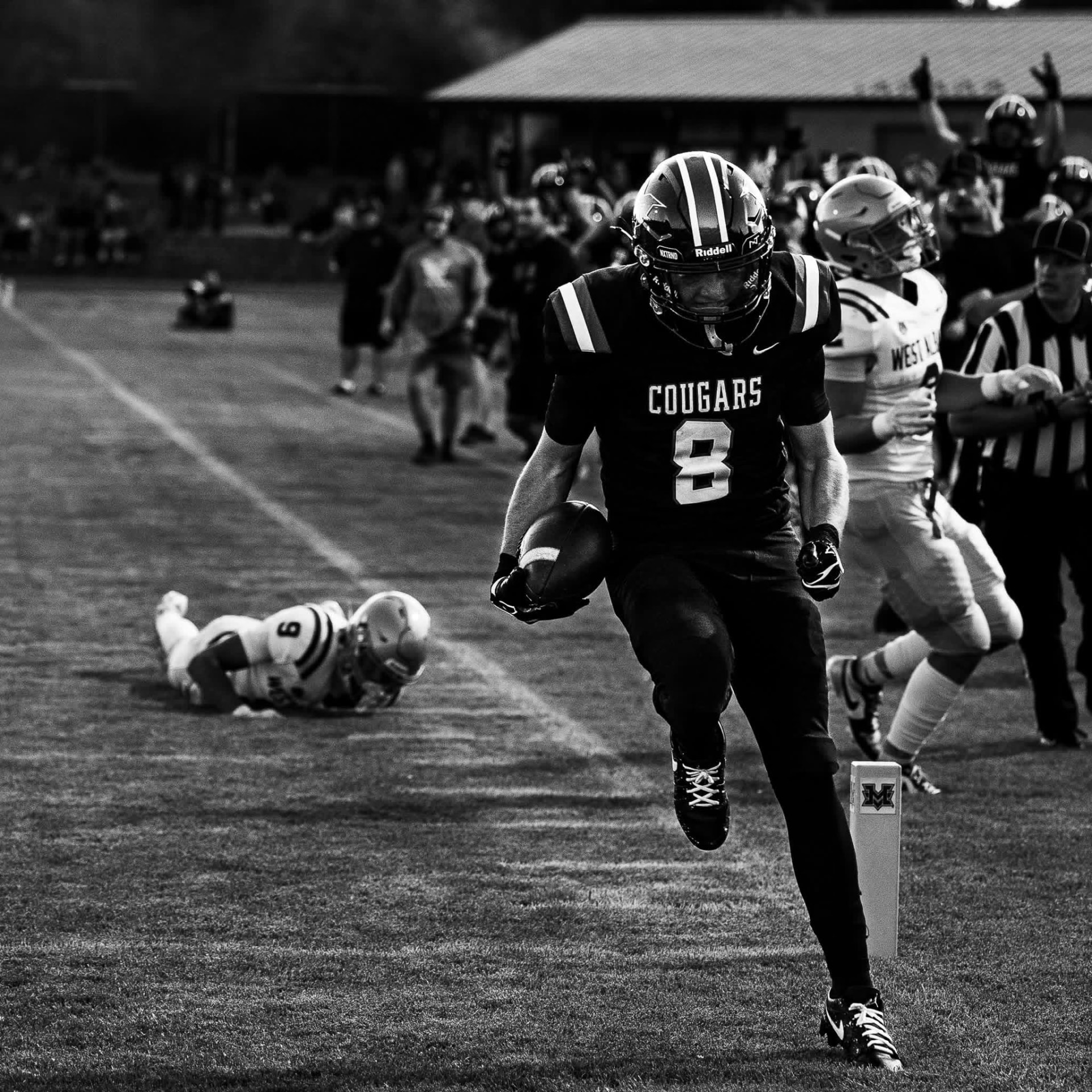 Cougars ball-carrier breaks loose on a run